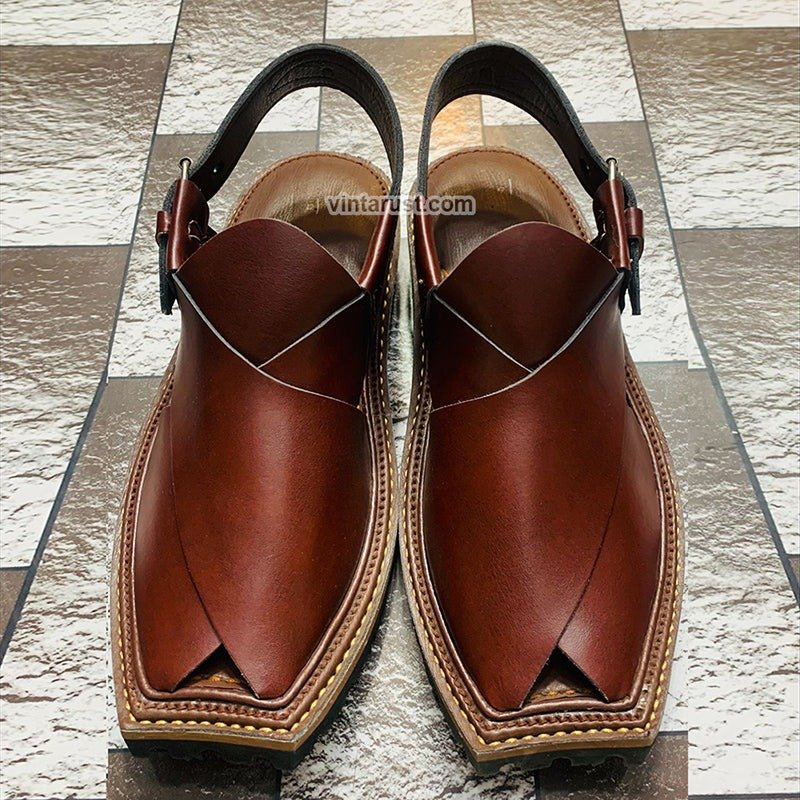 https://vintarust.com/cdn/shop/files/handmade-peshawari-leather-chappal.jpg?v=1730814333